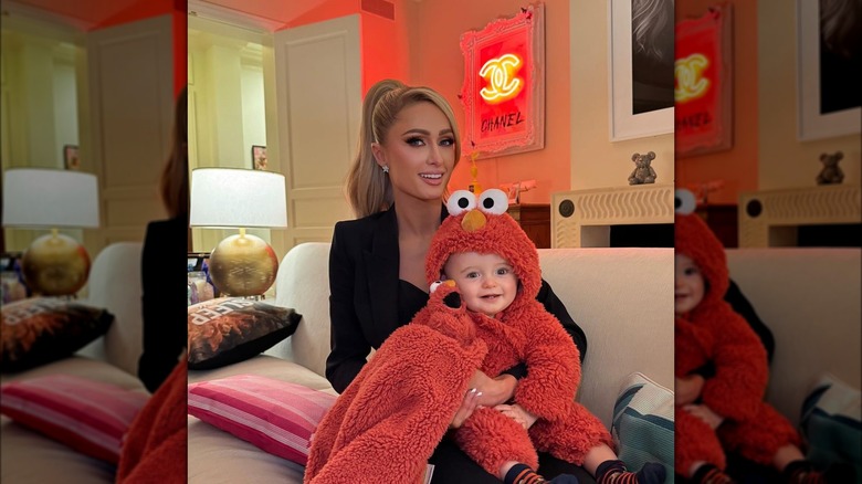Paris Hilton holds infant son Phoenix