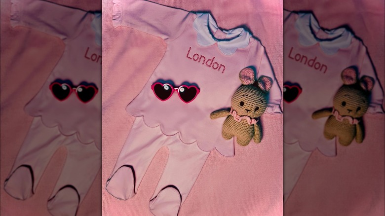 a pink infant ensemble with name "London" monogrammed on front