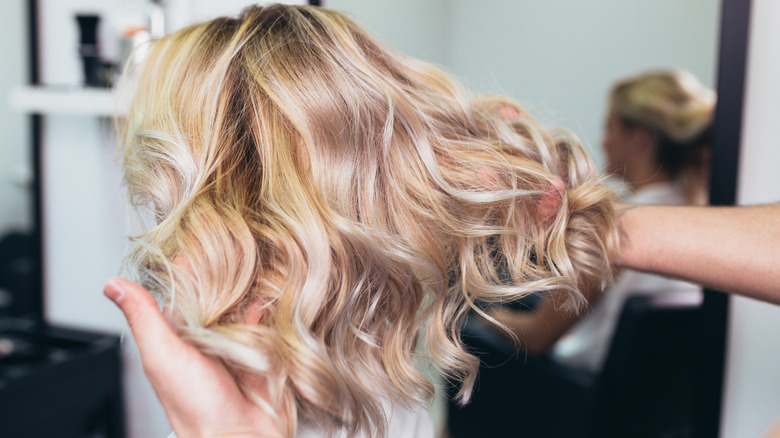 Woman with a head of full highlights.