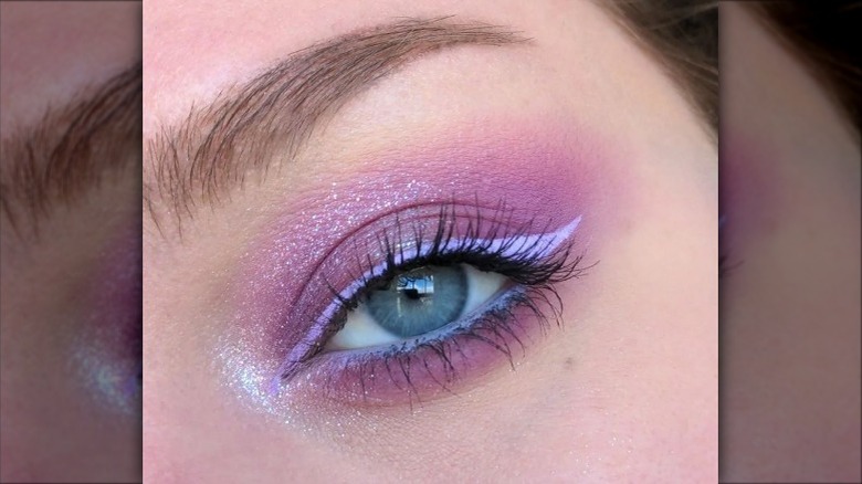 closeup of eye with pink makeup