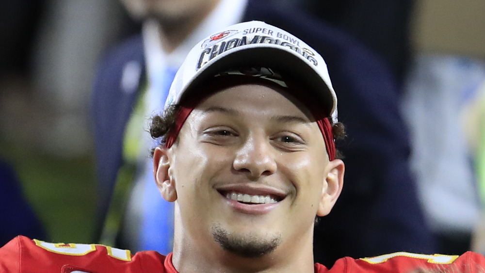 Patrick Mahomes smiles after a game