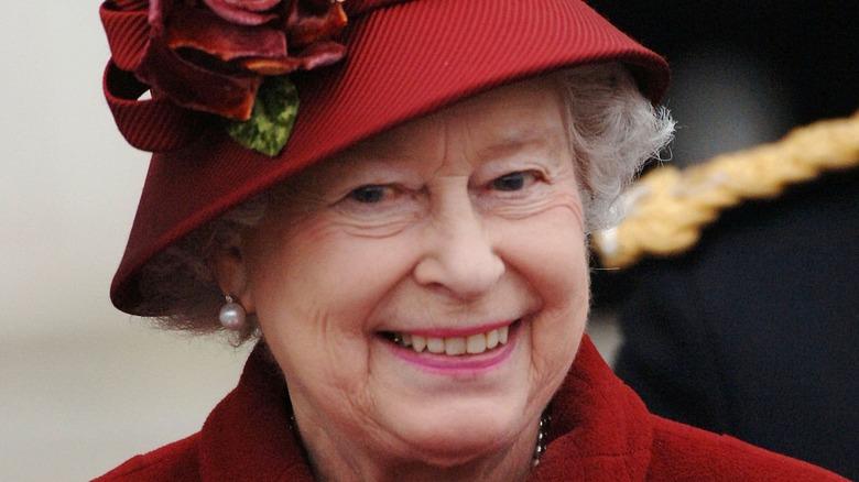 Queen Elizabeth smiles for a photo. 