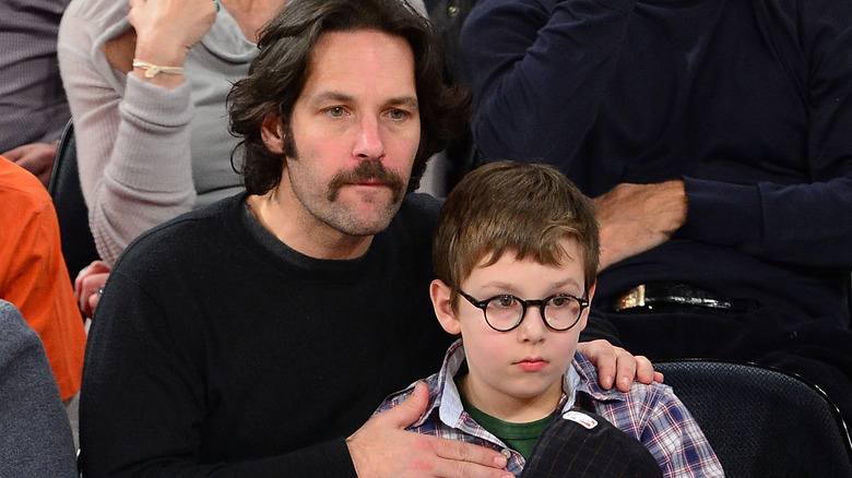 Paul and Jack Rudd watching basketball