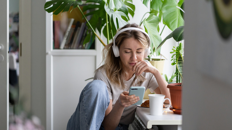 woman listening to a podcast