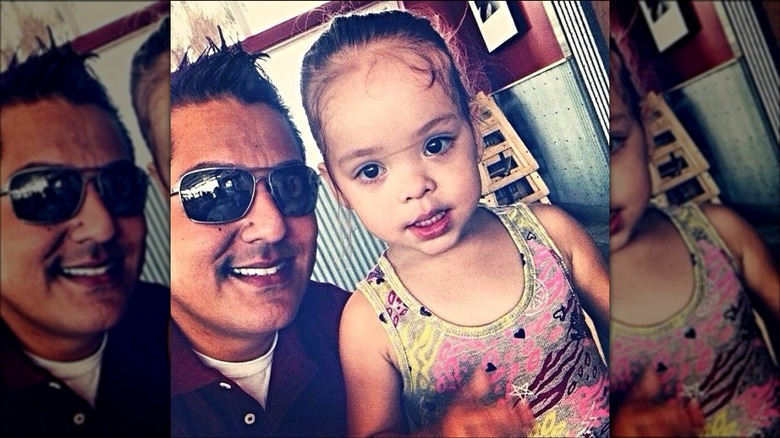 Mario Alejandro and daughter smiling