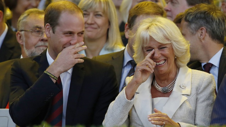 Prince William and Queen Camilla laughing