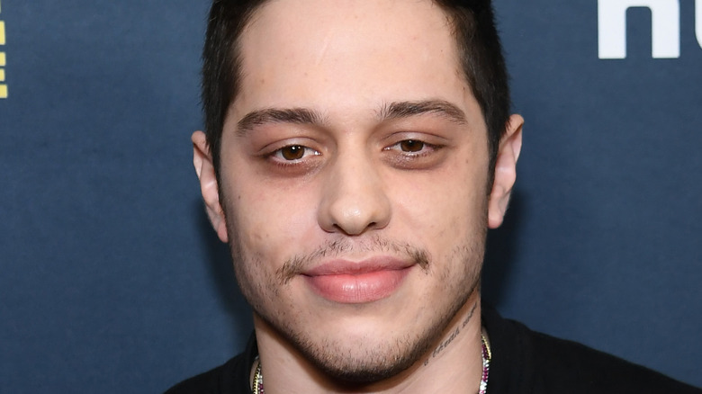 Pete Davidson poses on the red carpet