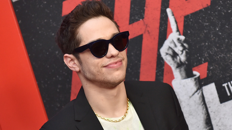 Pete Davidson wearing shades on red carpet