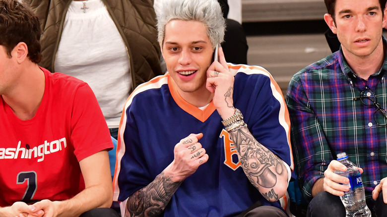 Pete Davidson talking on the phone