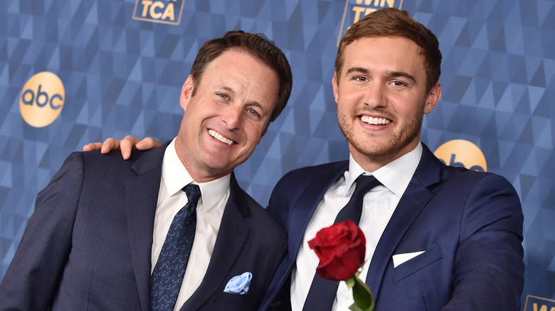 Peter Weber and Chris Harrison smiling