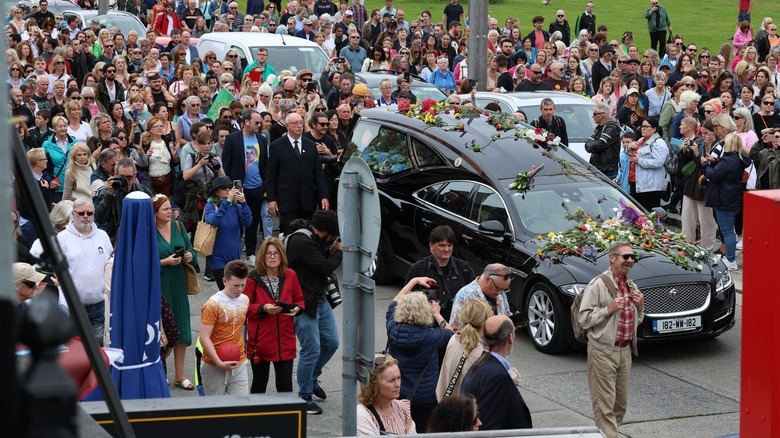 Crowds at Sinead O'Connor funeral procession through Bray 