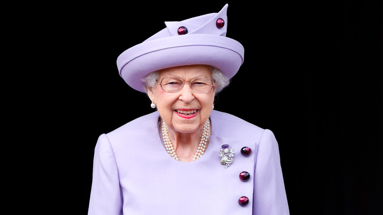 The queen dressed in purple
