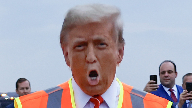 Donald Trump speaking wearing sanitation vest