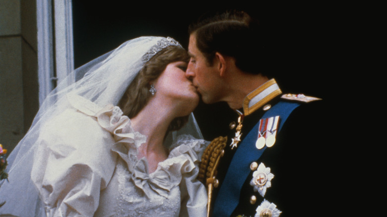 Diana and Charles kissing