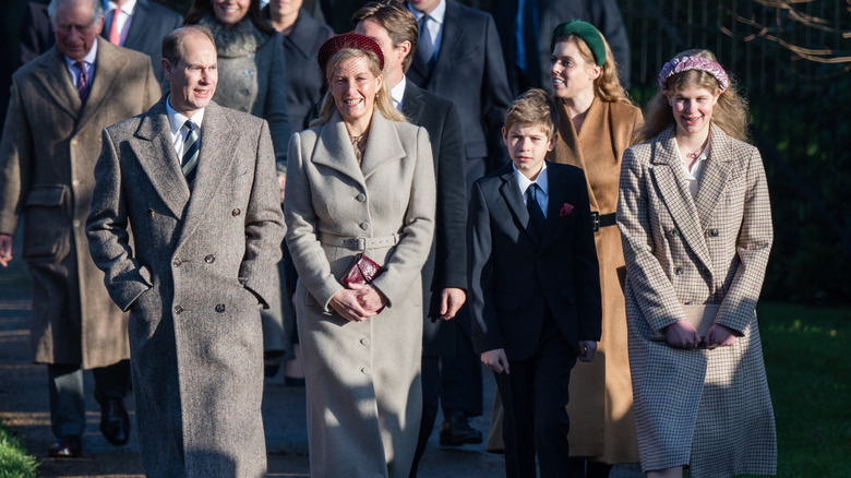 Prince Edward, Duke of Edinburgh, and his family walking