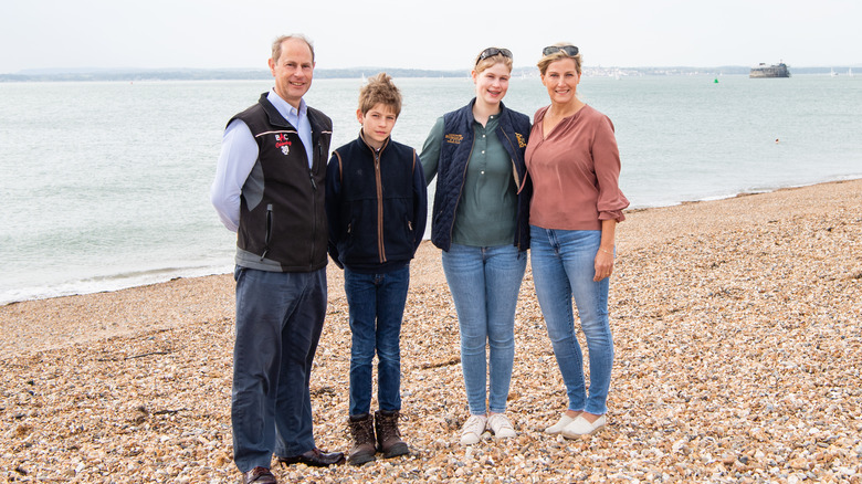 Prince Edward, Duke of Edinburgh, with his family on beach