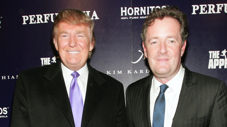 Piers Morgan and Donald Trump smiling 