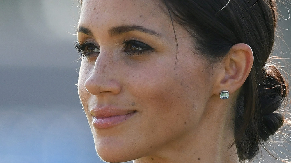 profile of Meghan Markle smiling