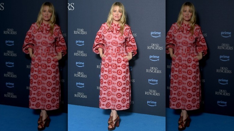 Woman in pink and red dress