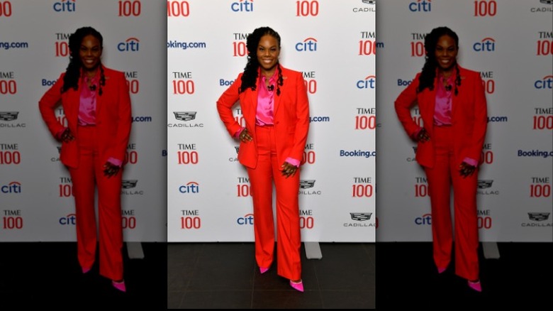 woman in pink and red outfit