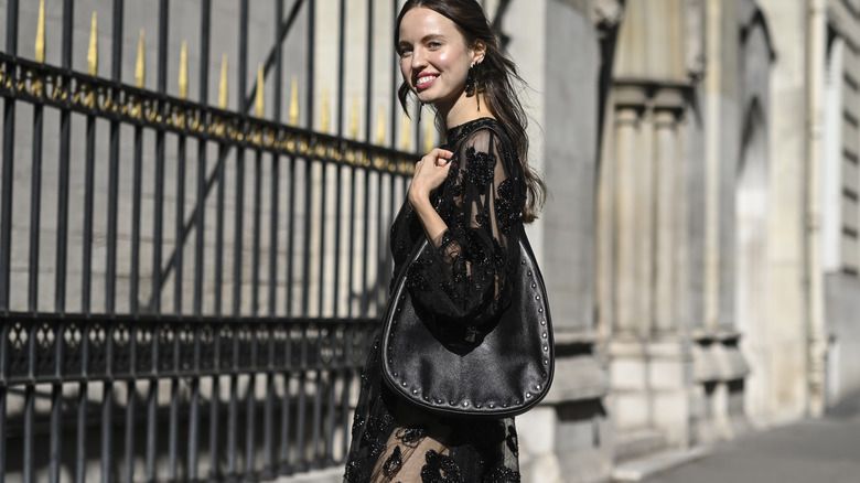 woman wearing sheer black dress