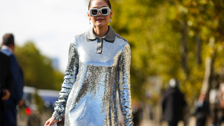 woman wearing silver sequin dress