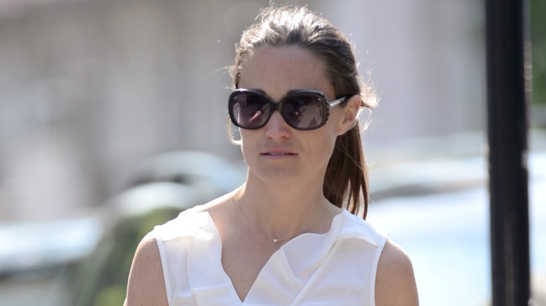 Pippa Middleton walking in sunglasses