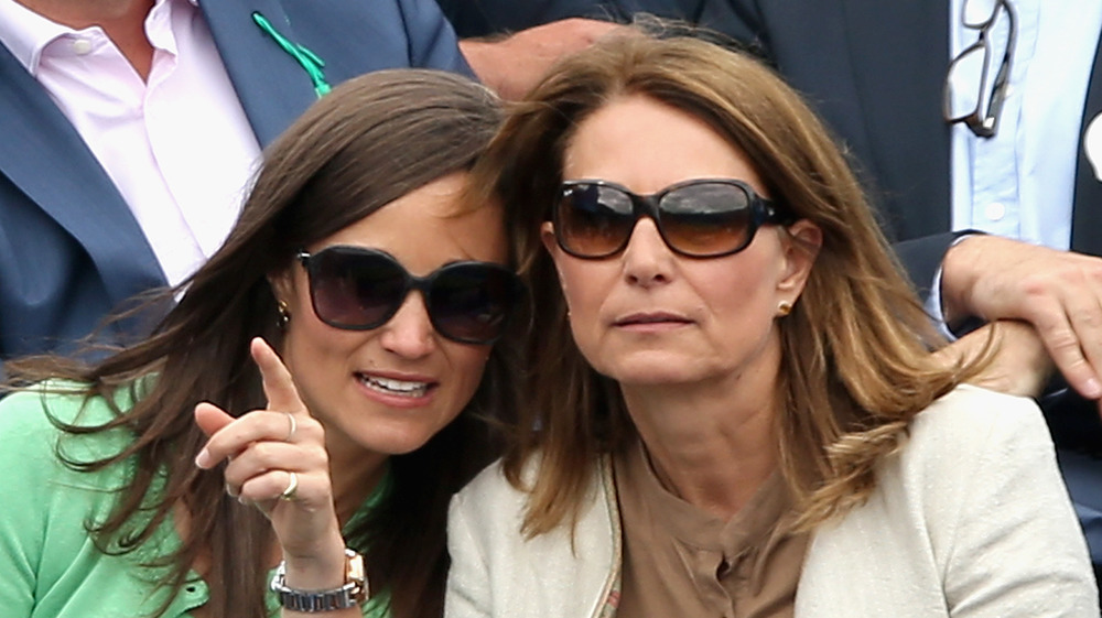 Pippa and Carole Middleton at game