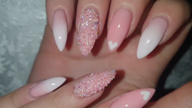 Pink pixie dust nail with hearts