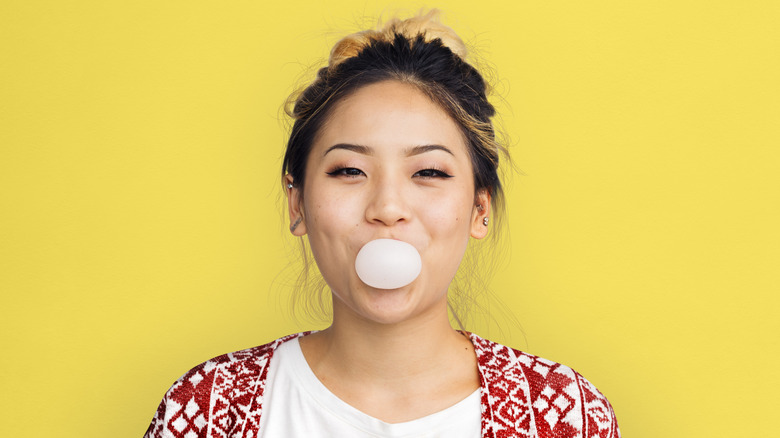 woman popping gum