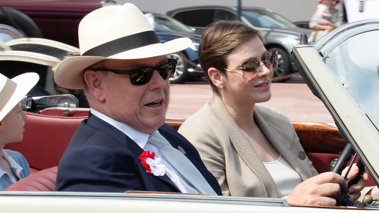 Charlene and Albert driving