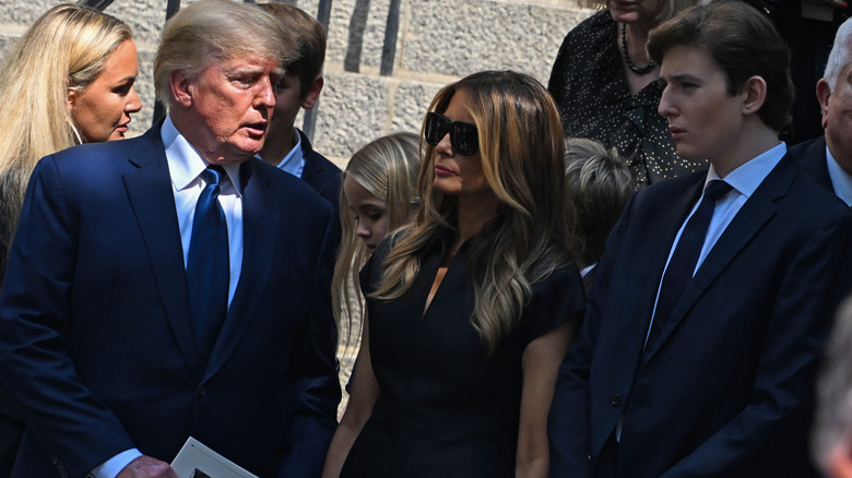 Donald Trump, Melania Trump, and Barron Trump at the funeral of Ivana Trump