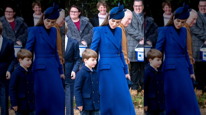 Kate Middleton and Prince Louis blue coats hand on back