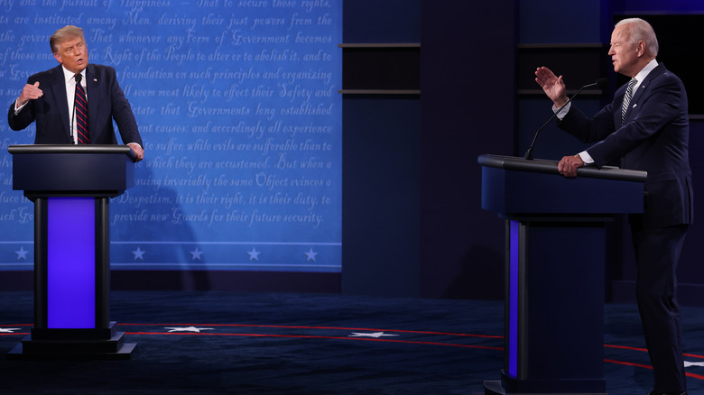 Donald Trump and Joe Biden debating at podiums
