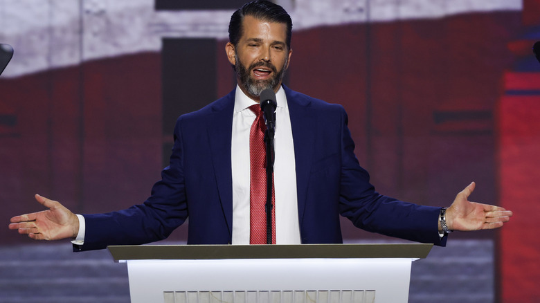 Donald Trump Jr. speaking into mic