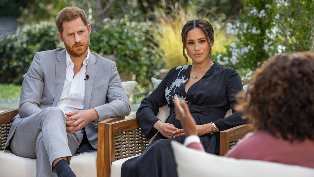 Prince Harry and Meghan Markle speaking to Oprah