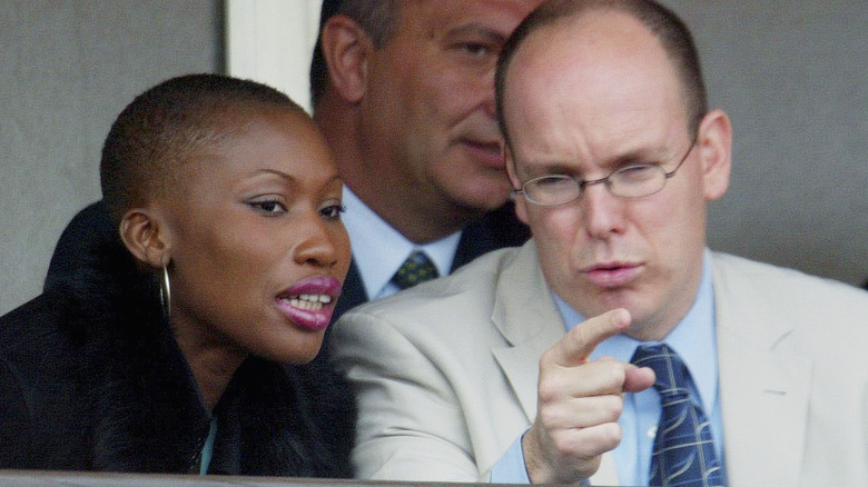 Albert and Nicole Coste speaking and pointing