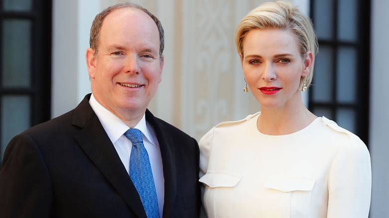 Princess Charlene and Prince Albert posing