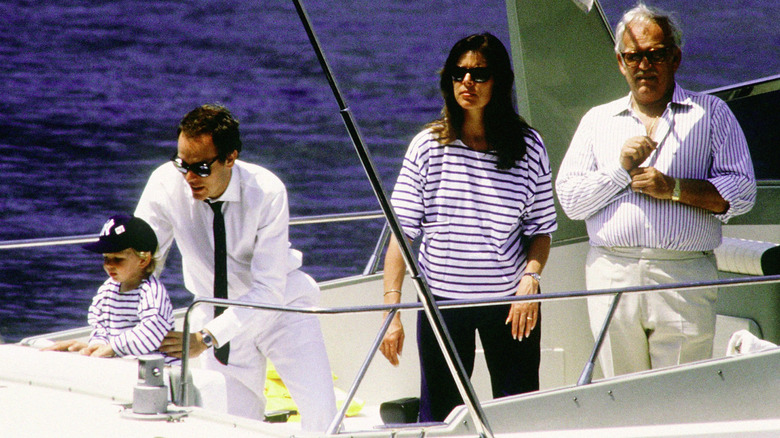 Prince Albert, Princess Caroline, and Prince Ranier on a boat