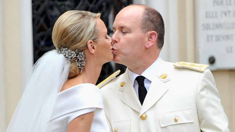 Prince Albert and Princess Charlene kissing on wedding day