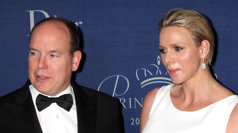 Prince Albert and Princess Charlene of Monaco pose in their finery