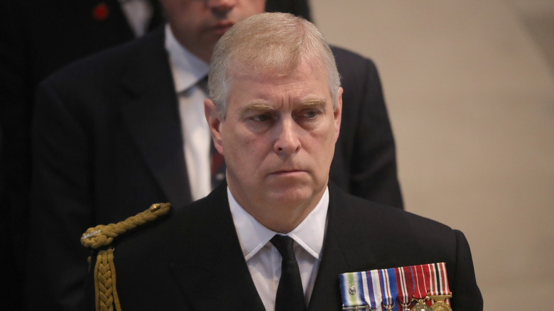 Prince Andrew frowning 