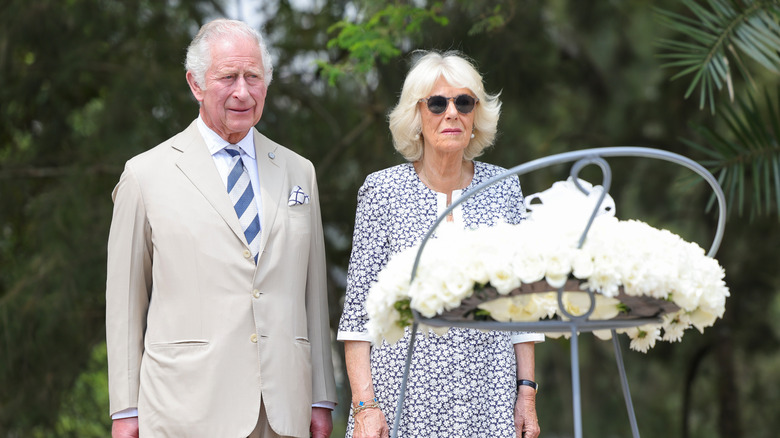 Prince Charles and Camilla Parker-Bowles laying a wreath in Rwanda