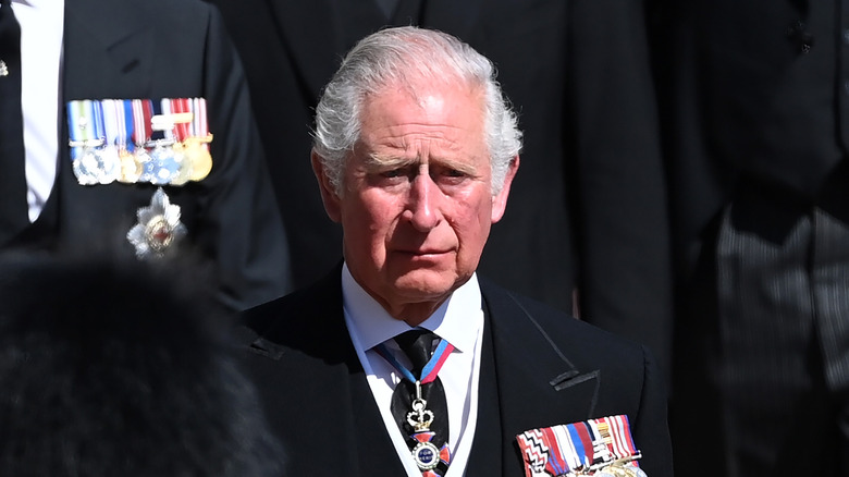 Prince Charles looks downtrodden