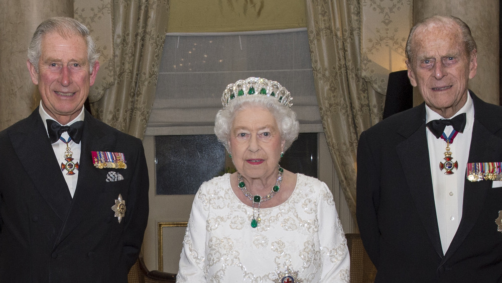 Prince Charles with Queen Elizabeth and Prince Philip