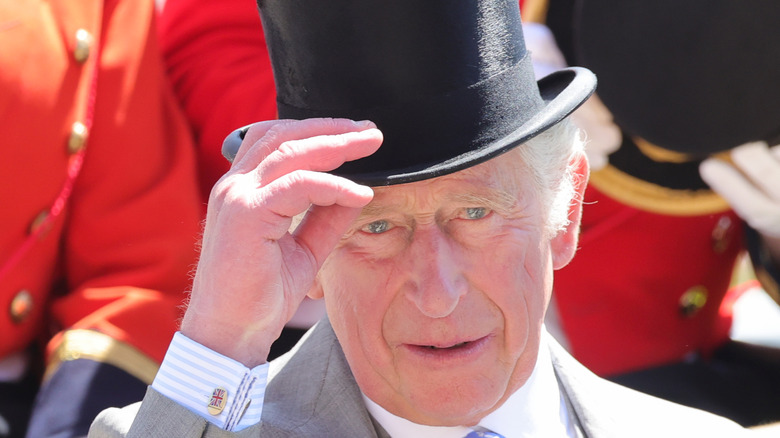 Prince Charles wearing a top hat at the Royal Ascot