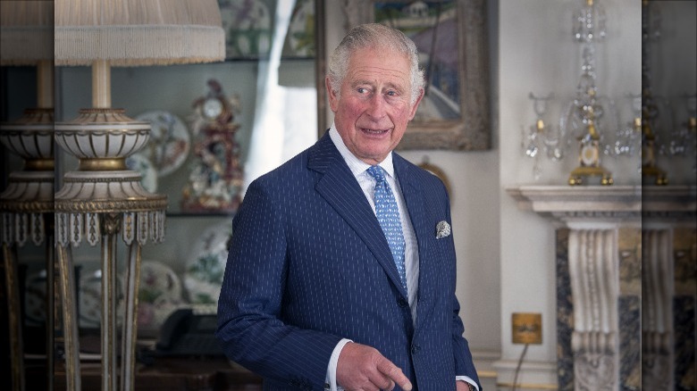 Prince Charles standing in Clarence House, where he lives with Camilla Parker Bowles