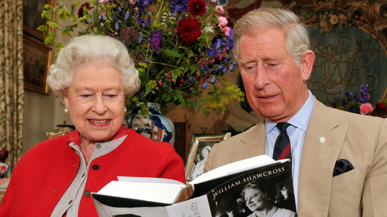 Prince Charles with Queen Elizabeth II