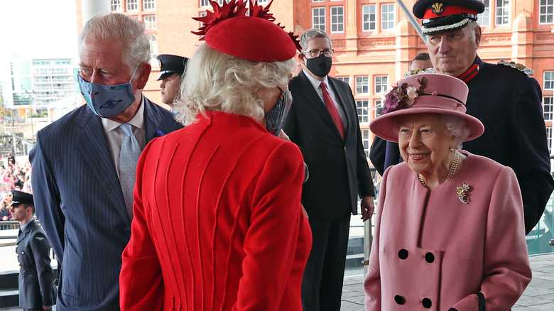 Queen Elizabeth, Charles, and Camilla, in Wales