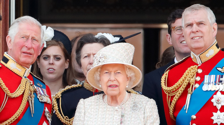 prince andrew, queen elizabeth, and prince charles